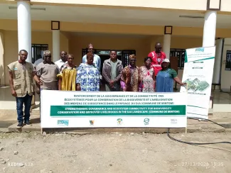 Stakeholders pose at Oveng Council after concertation