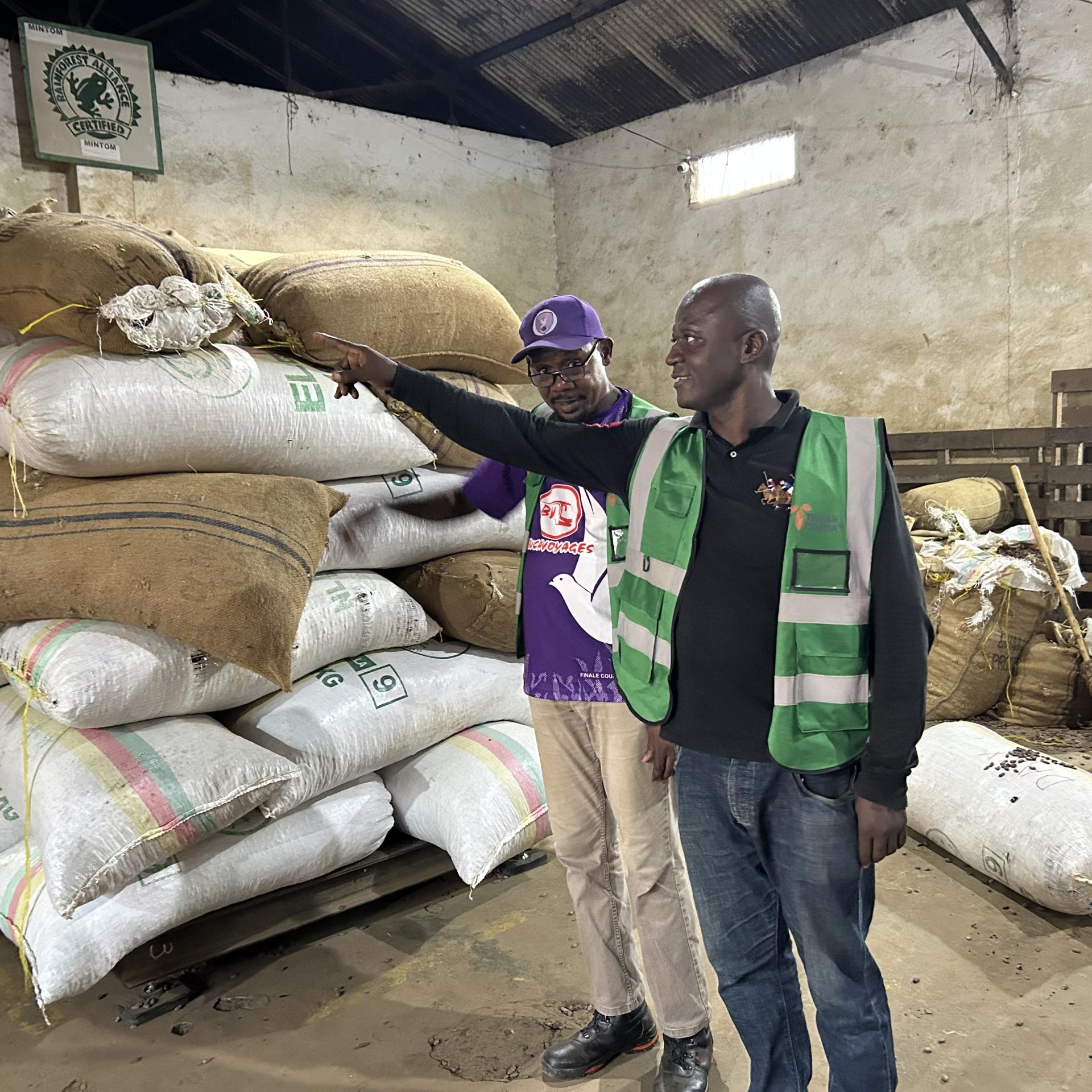 two men in a storehouse